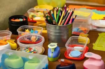 assorted color pencils in clear plastic container